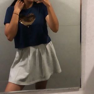 Grey skirt .